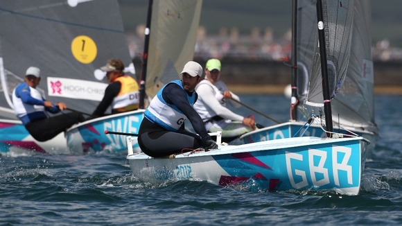Great Britain's Ben Ainslie during the Men's Finn Medal Race with Denmark's Jonas Hogh-Christensen (left) close behind 