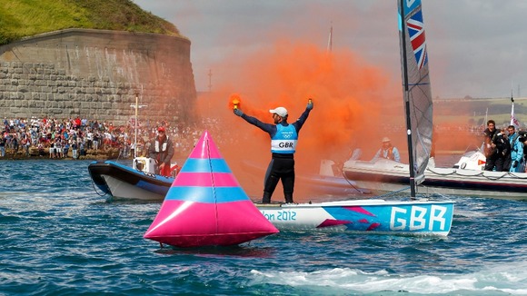 Ben Ainslie celebrates in Weymouth