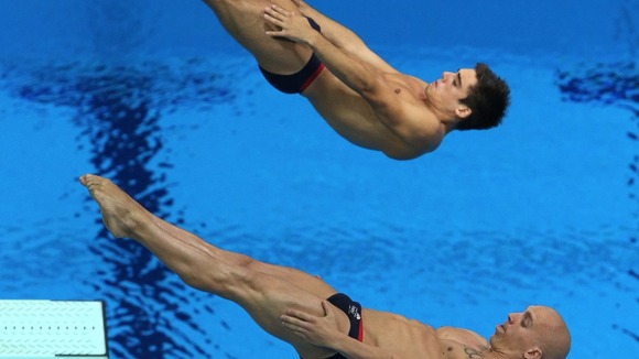 Chris Mears (top) and Nick Robinson-Baker dive during the Mens's Synchronised 3m Springboard
