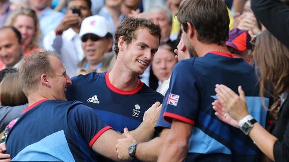 Murray climbed up to the players' box after his victory.