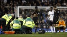 Fabrice Muamba receives medical attention during the match at White Hart Lane
