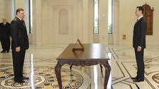Riyad Hijab is sworn in as new Prime Minister by Syrian President Bashar al-Assad on 26th June