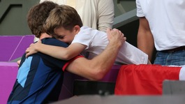 Henry hugs Team GB's Andy Murray after he won gold against Roger Federer at Wimbledon