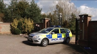 Police car and police officers