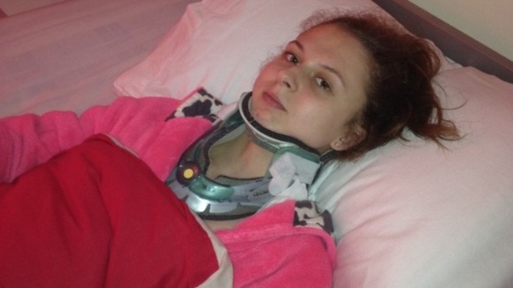 Toni Moody-Miller in a neck collar shortly after the attack