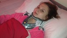 Toni Moody-Miller in a neck collar shortly after the attack