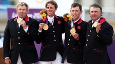 Great Britain's (from left to right) Peter Charles, Ben Maher, Scott Brash and Nick Skelton celebrate with their Gold medals
