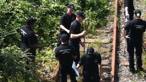 Police searching rail line