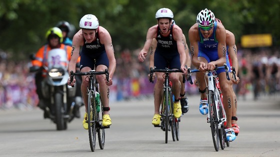 Great Britain's Alistair Brownlee (left) with Jonathan Brownlee (centre) in the Cycling stage