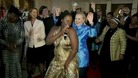 US Secretary of State Hillary Clinton dances at a dinner in South Africa