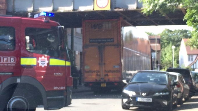 The Halfords lorry stuck under the bridge at Elmers End
