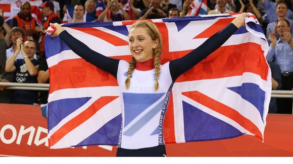 Laura Trott celebrates after winning the women's cycling omnium on Tuesday
