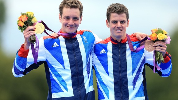 Great Britain's Brownlee brothers celebrate their Olympic medals on Tuesday.