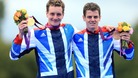Great Britain's Brownlee brothers celebrate their Olympic medals on Tuesday.