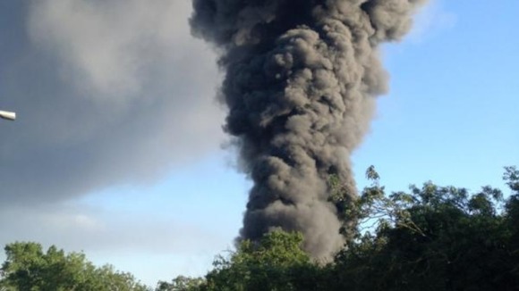 Fire services are trying to tackle a huge warehouse fire in Coventry.