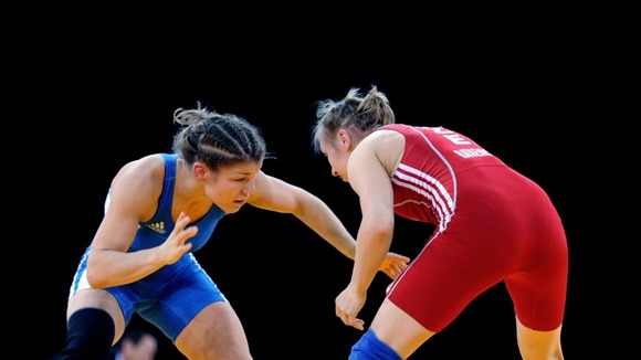 Great Britain's Olga Butkevych (left) competes in the -55kg freestyle event.