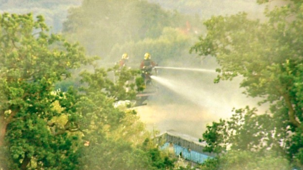Fire fighters on an aerial ladder platform