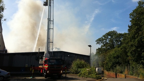 Fire fighters are still damping down at the scene