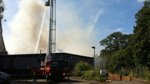 Fire fighters are still damping down at the scene