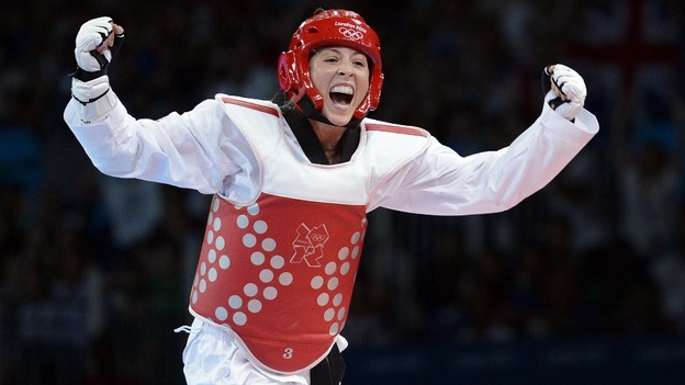 Jones celebrates after defeating South Korea's Li-Cheng Tseng in the under -57kg semi-final.