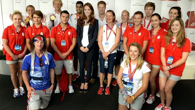 The Duchess of Cambridge and Prince Harry pose with athletes at Team GB House.