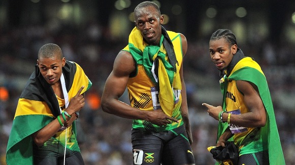 Jamaica's Warren Weir, Usain Bolt and Yohan Blake celebrate.