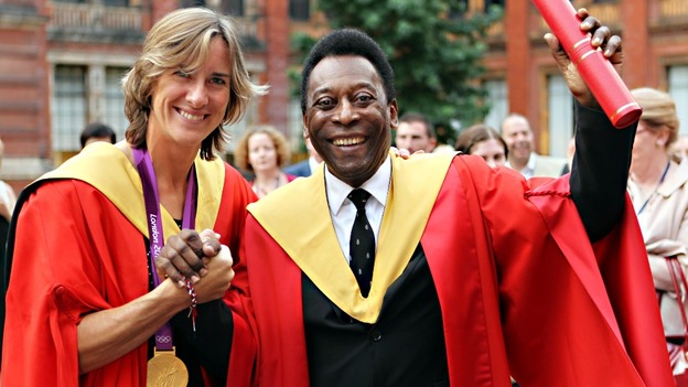Olympic gold medal winning rower Katherine Grainger, a graduate of the University, stands with former footballer Pele.