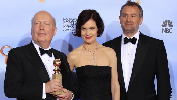 Julian Fellows (left) with actors Elizabeth McGovern and Hugh Bonneville.