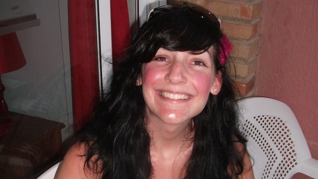 Charlotte Blackman with a flower in her hair