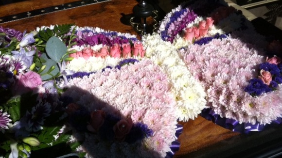 Flowers in the shape of a butterfly for Charlotte Blackman