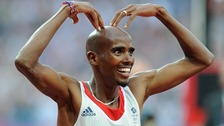 Mo Farah celebrates winning the Men's 5,000m 