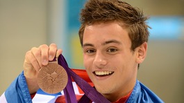 Great Britain's Tom Daley as he celebrates his bronze medal in the men's 10m platform final.
