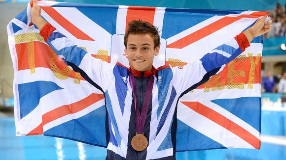 Daley celebrates his first Olympic medal.
