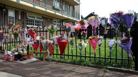 Flowers outside a block of flats, in Mitcham, south London, where Natalie Sharp, the mother of Tia Sharp, lives.