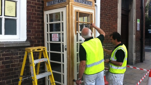 A phone box is painted gold to honour Luke Campbell