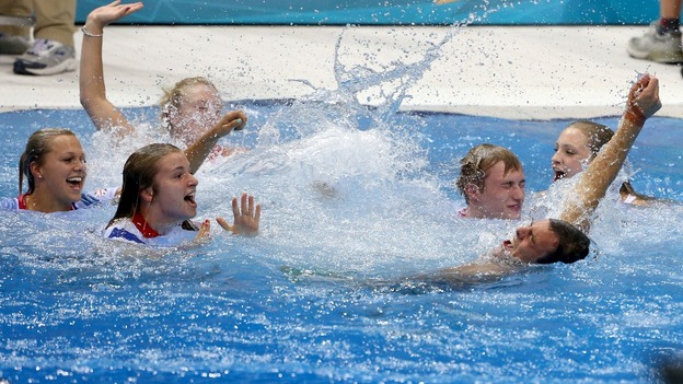 Tom Daley celebrates his Bronze medal in the Men's 10m Platform Final at the Aquatics Centre