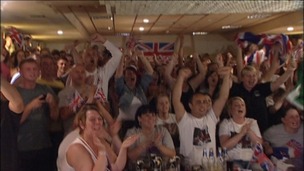 friends celebrate gold win