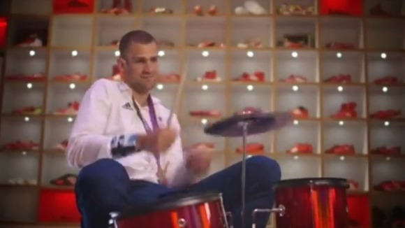 Robbie Grabarz plays the drums