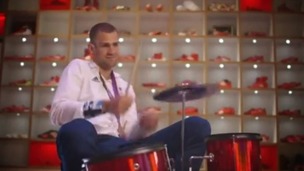 Robbie Grabarz plays the drums