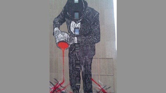 Street art - man with paint pot