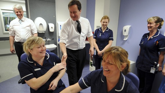 David Cameron and Andrew Lansley talking to nurses