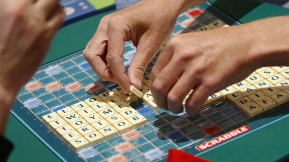 People playing Scrabble