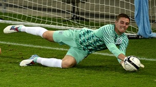 England goalkeeper Jack Butland makes a save on his debut during the International Challenge match at Wankdorf Stadium,