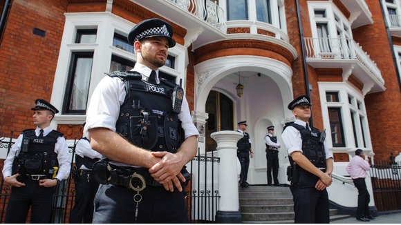 Police officers outside the Embassy of Ecuador in Knightsbridge, central London