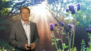 Simon Parkin in front of weather photo