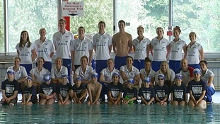 Olympic athletes line up with young swimmers at the Gurnell leisure centre in Ealing.