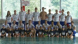 Olympic athletes line up with young swimmers at the Gurnell leisure centre in Ealing.