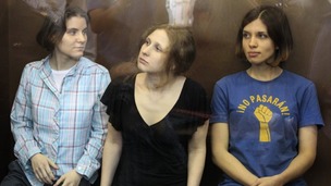 Pussy Riot members listen to the judge's guilty verdict
