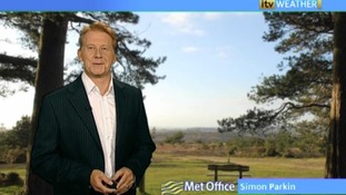 Simon Parkin in front of weather photo