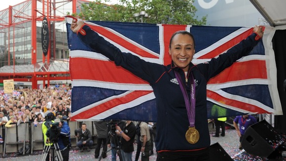 Great Britain's Jessica Ennis celebrates with her gold medal during her Olympic homecoming in Sheffield city centre